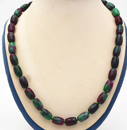 Green rice-shaped bead necklace - close-up view