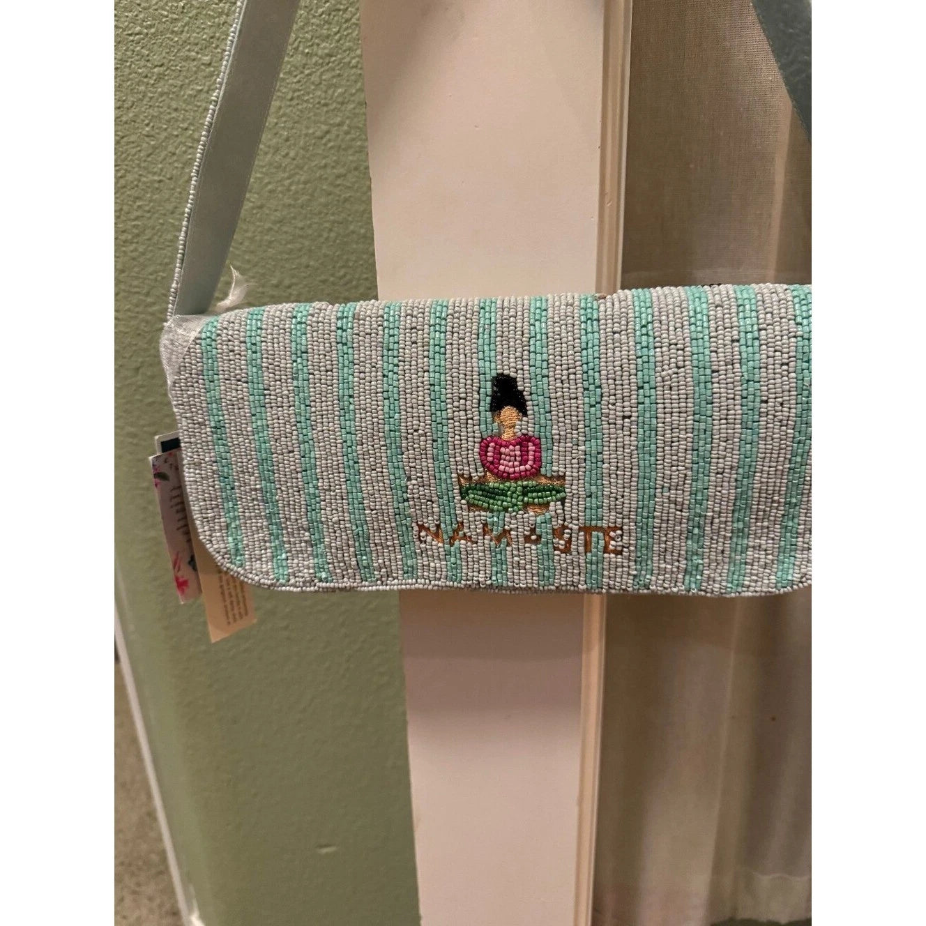 Mint green yoga beaded crossbody clutch bag - back view