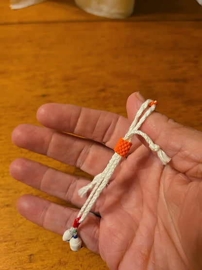 Multicolor paper bead adjustable bracelet - worn view