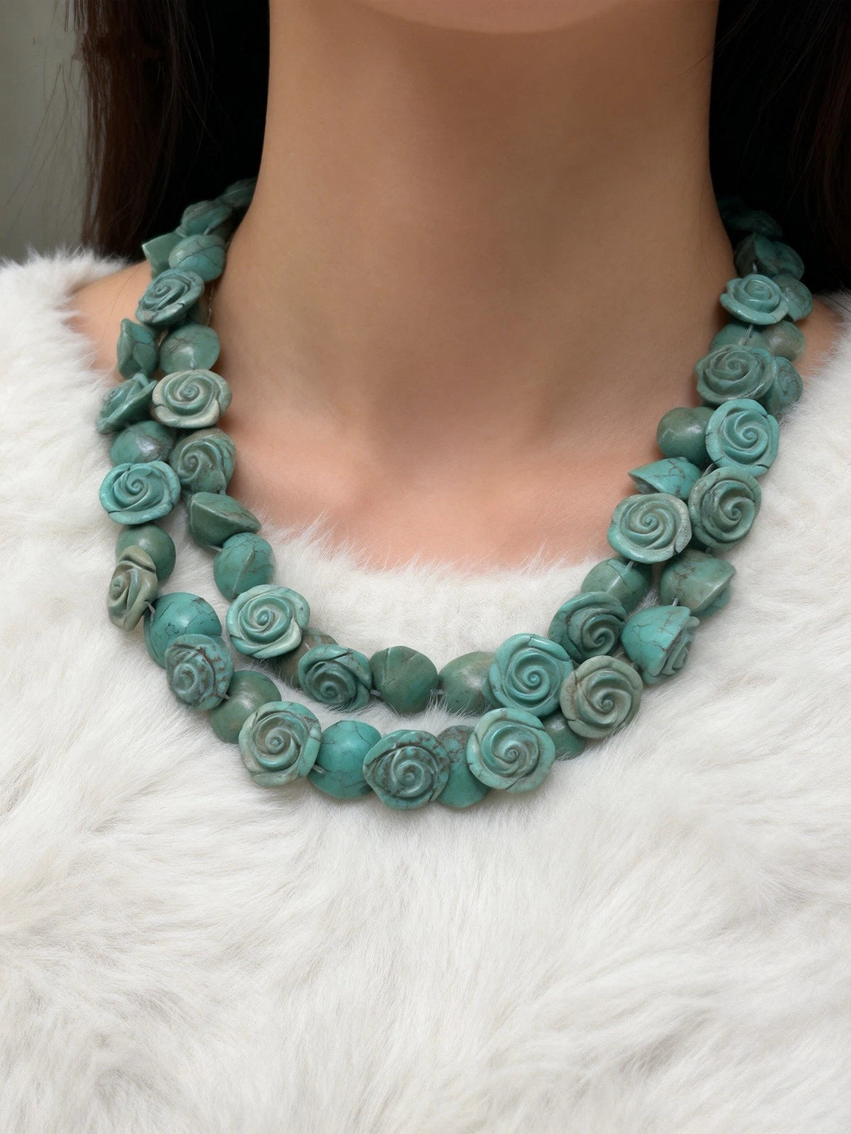 Blue carved rose double-strand necklace - front view