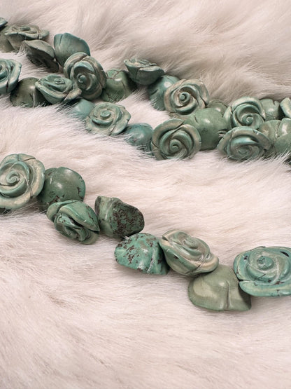 Blue carved rose double-strand necklace - close-up view